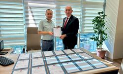KESOB’un konut projesinde arsaların tapuları alındı