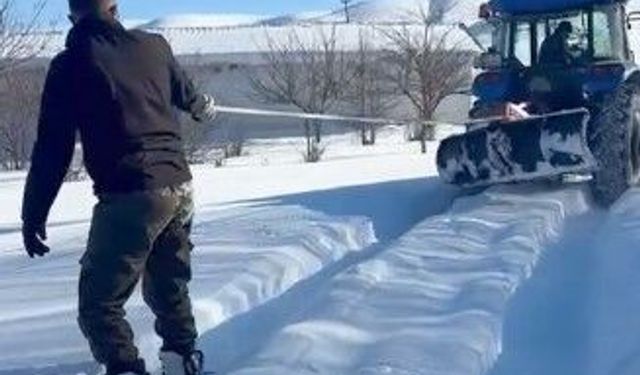 Traktör arkasında kayak keyfi